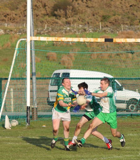 Action from the division three senior reserve football league match against Naomh Columba.