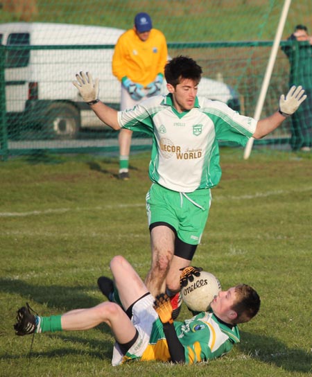 Action from the division three senior reserve football league match against Naomh Columba.