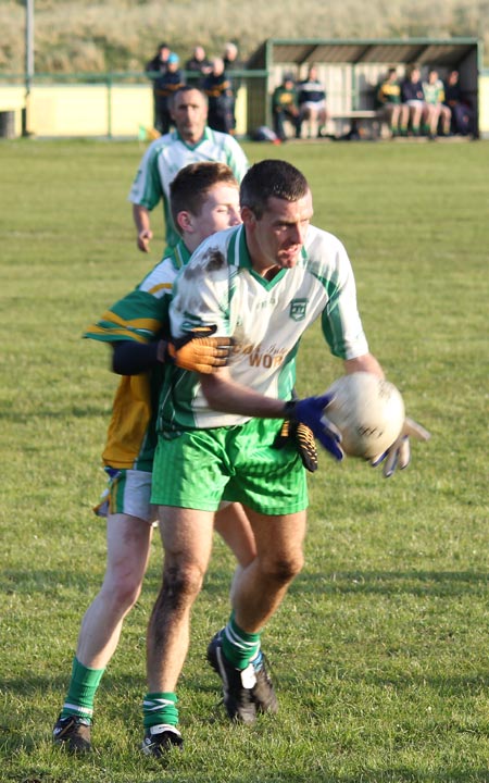 Action from the division three senior reserve football league match against Naomh Columba.