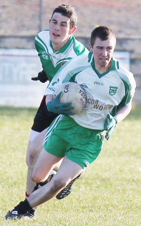 Action from the division three senior reserve football league match against Urris.