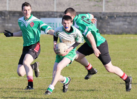 Action from the division three senior reserve football league match against Urris.