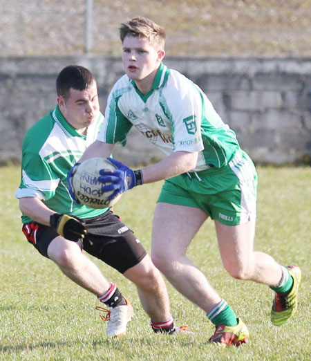 Action from the division three senior reserve football league match against Urris.