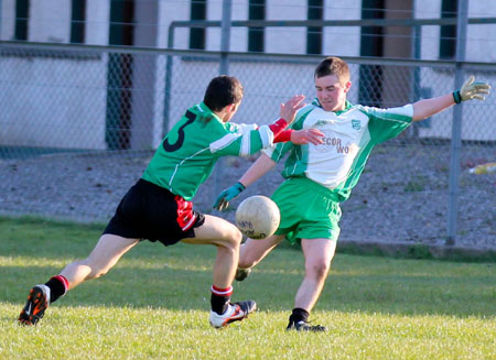 Action from the division three senior reserve football league match against Urris.