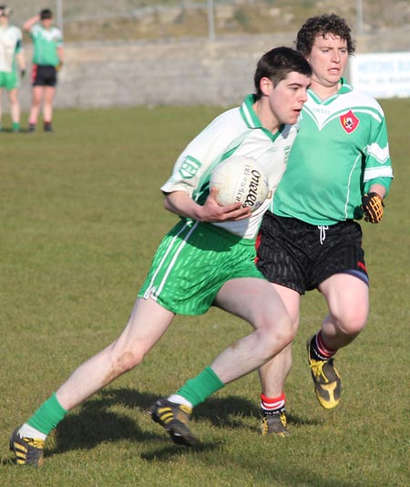 Action from the division three senior reserve football league match against Urris.