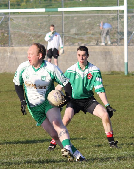 Action from the division three senior reserve football league match against Urris.