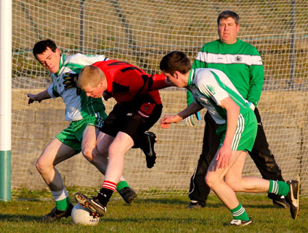 Action from the division three senior football league match against Urris.