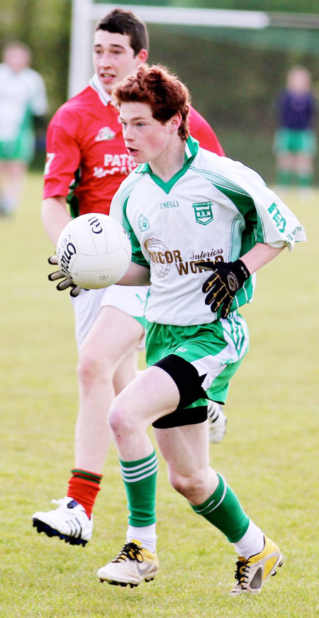 Action from the division three senior reserve football league match against Carndonagh.