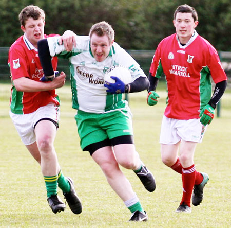 Action from the division three senior reserve football league match against Carndonagh.