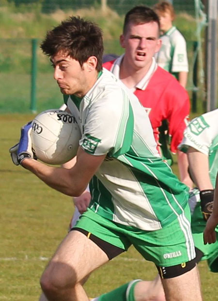 Action from the division three senior reserve football league match against Carndonagh.