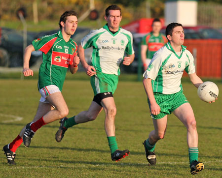 Action from the division three senior football league match against Carndonagh.