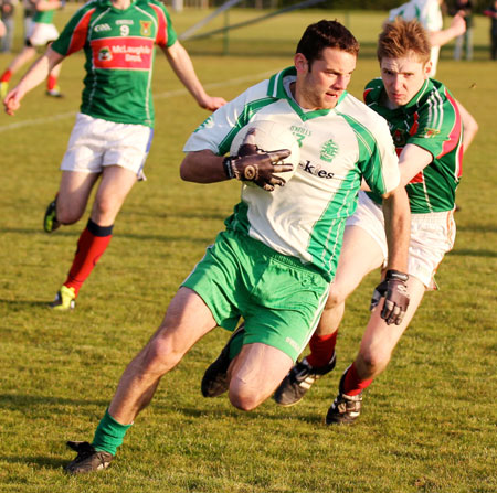 Action from the division three senior football league match against Carndonagh.