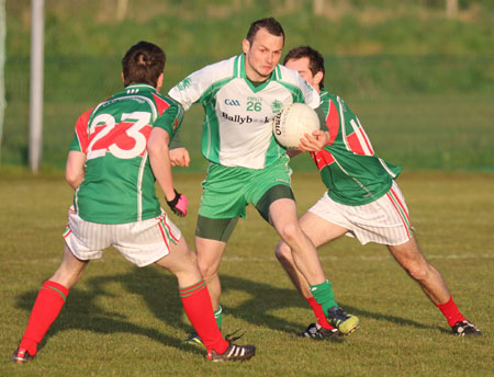 Action from the division three senior football league match against Carndonagh.