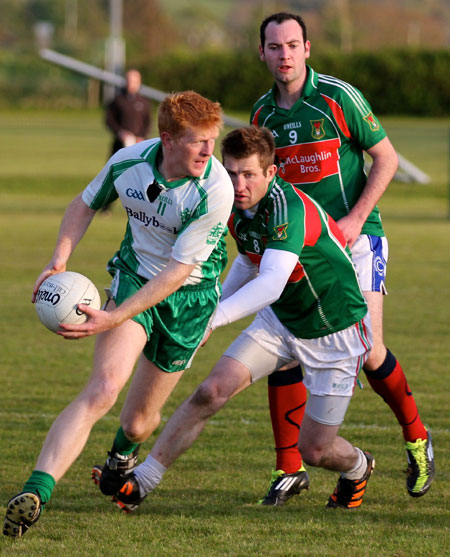 Action from the division three senior football league match against Carndonagh.