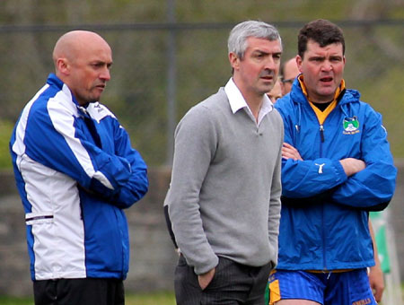 Action from the division three senior football league match against Burt.