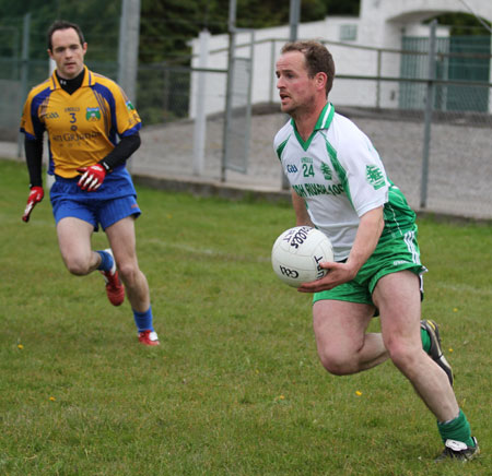 Action from the division three senior football league match against Burt.