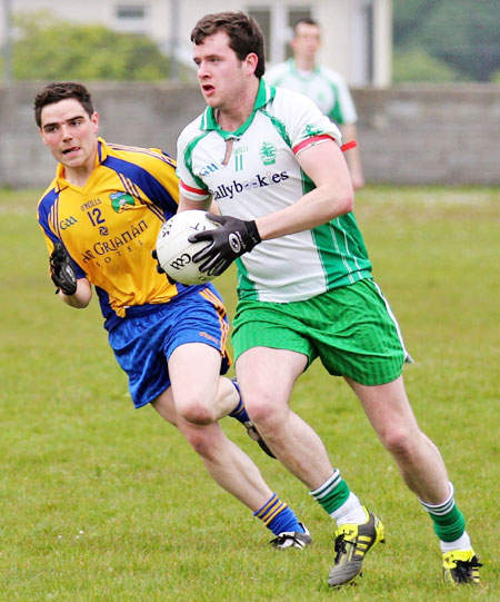 Action from the division three senior football league match against Burt.