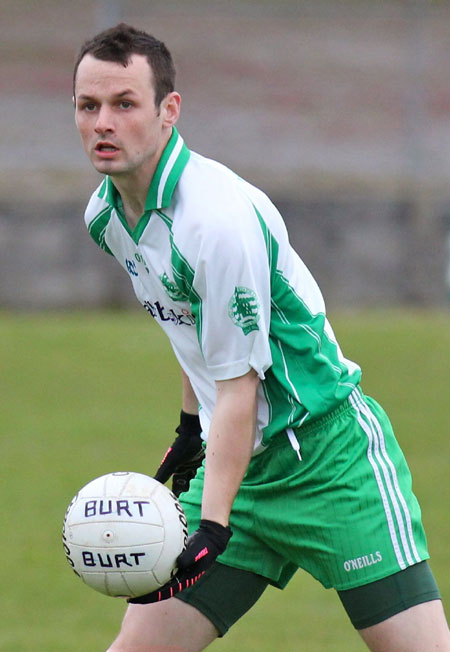 Action from the division three senior football league match against Burt.