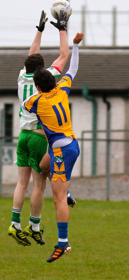 Action from the division three senior football league match against Burt.