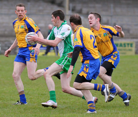 Action from the division three senior football league match against Burt.