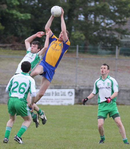 Action from the division three senior football league match against Burt.