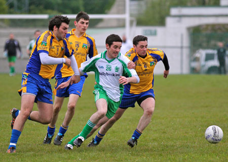 Action from the division three senior football league match against Burt.