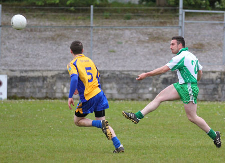 Action from the division three senior football league match against Burt.