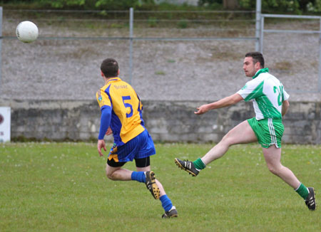 Action from the division three senior football league match against Burt.