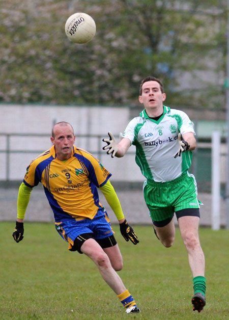 Action from the division three senior football league match against Burt.