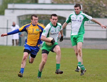 Action from the division three senior football league match against Burt.