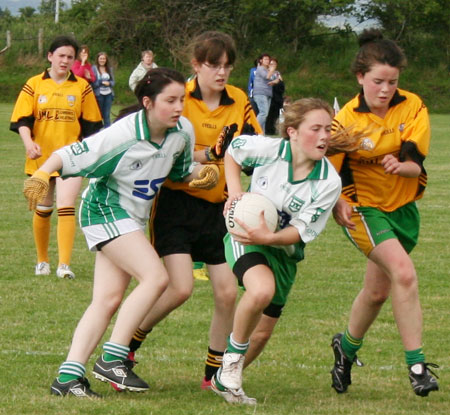 Action from the ladies under 14 match between Aodh Ruadh and Malin.