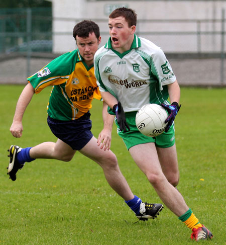 Action from the division three senior reserve football league match against Downings.