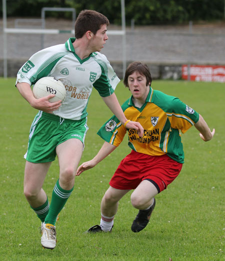 Action from the division three senior reserve football league match against Downings.