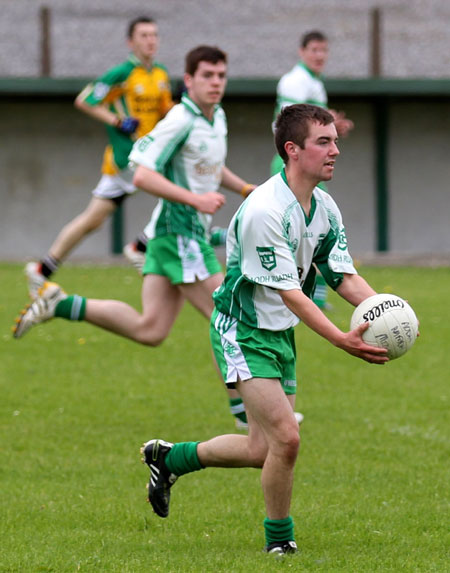 Action from the division three senior reserve football league match against Downings.