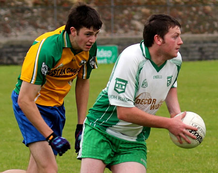 Action from the division three senior reserve football league match against Downings.