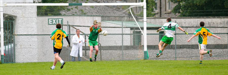 Action from the division three senior reserve football league match against Downings.