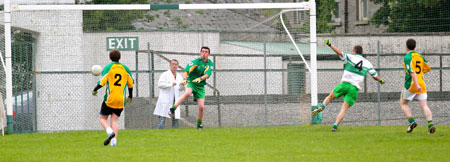 Action from the division three senior reserve football league match against Downings.