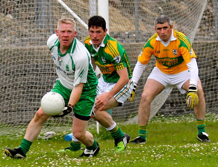 Action from the division three senior football league match against Downings.