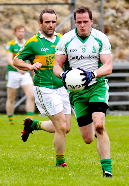 Action from the division three senior football league match against Downings.