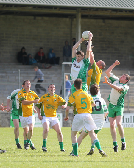 Action from the division three senior reserve football league match against Naomh Columba.