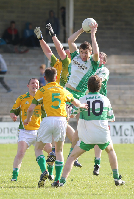 Action from the division three senior reserve football league match against Naomh Columba.