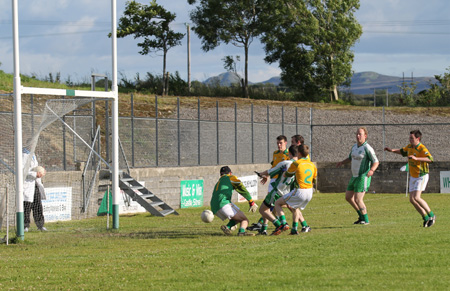 Action from the division three senior reserve football league match against Naomh Columba.