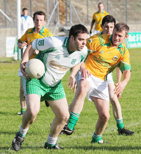 Action from the division three senior reserve football league match against Naomh Columba.