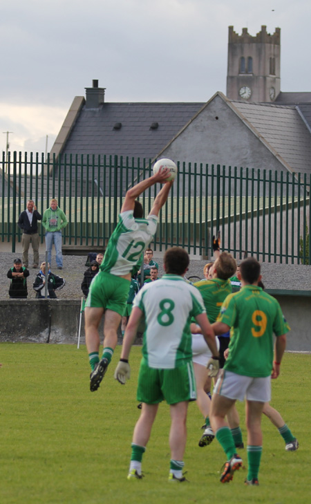 Action from the division three senior football league match against Naomh Columba.