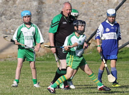 Action from the under 12 hurling game between Aodh Ruadh and Four Masters.