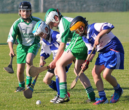 Action from the under 12 hurling game between Aodh Ruadh and Four Masters.