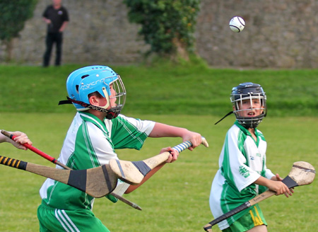 Action from the under 12 hurling game between Aodh Ruadh and Four Masters.