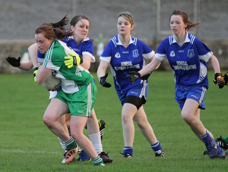 Action from the ladies senior match between Aodh Ruadh and Four Masters.