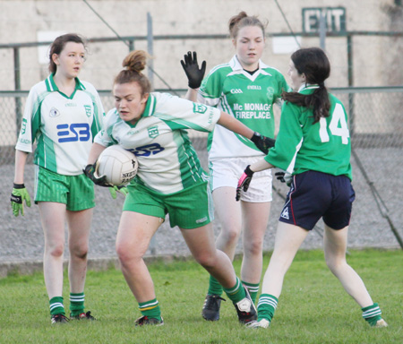 Action from the ladies under 16 match between Aodh Ruadh and Saint Naul's.