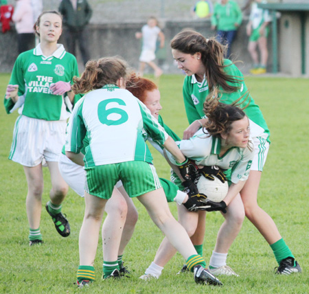 Action from the ladies under 16 match between Aodh Ruadh and Saint Naul's.