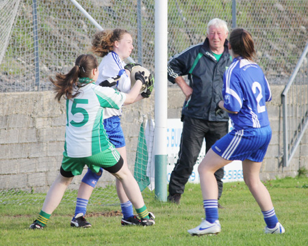 Action from the ladies under 16 match between Aodh Ruadh and Four Masters.